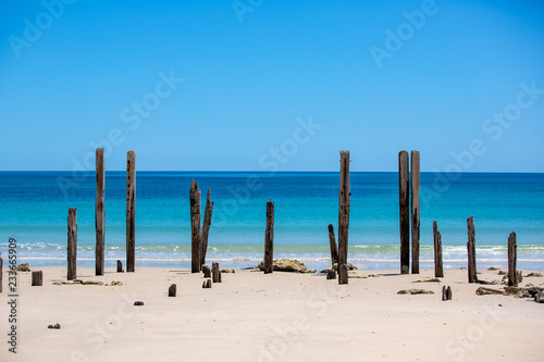 The beautiful Port Willunga beach and iconic jetty ruins with turquoise waters on a calm sunny day on 15th November 2018