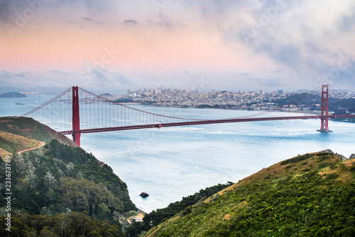 Panoramic view of Golden Gate Bridge connecting San Francisco and Marin Headlands, on a cloudy afternoon