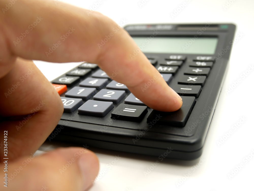 Hand use calculator isolated on white background Hand use calculator isolated on white background
