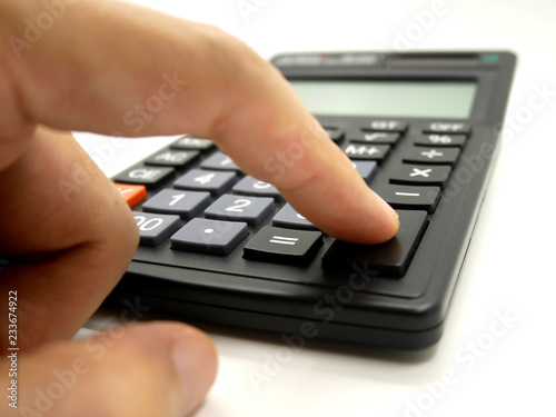 Hand use calculator isolated on white background