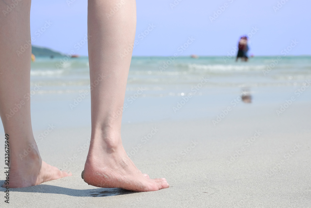 Leg of woman is on the ground. She is about to walk to exercise in the morning. Health and Relaxation Concepts Leg of woman is on the ground. She is about to walk to exercise in the morning. Health and Relaxation Concepts