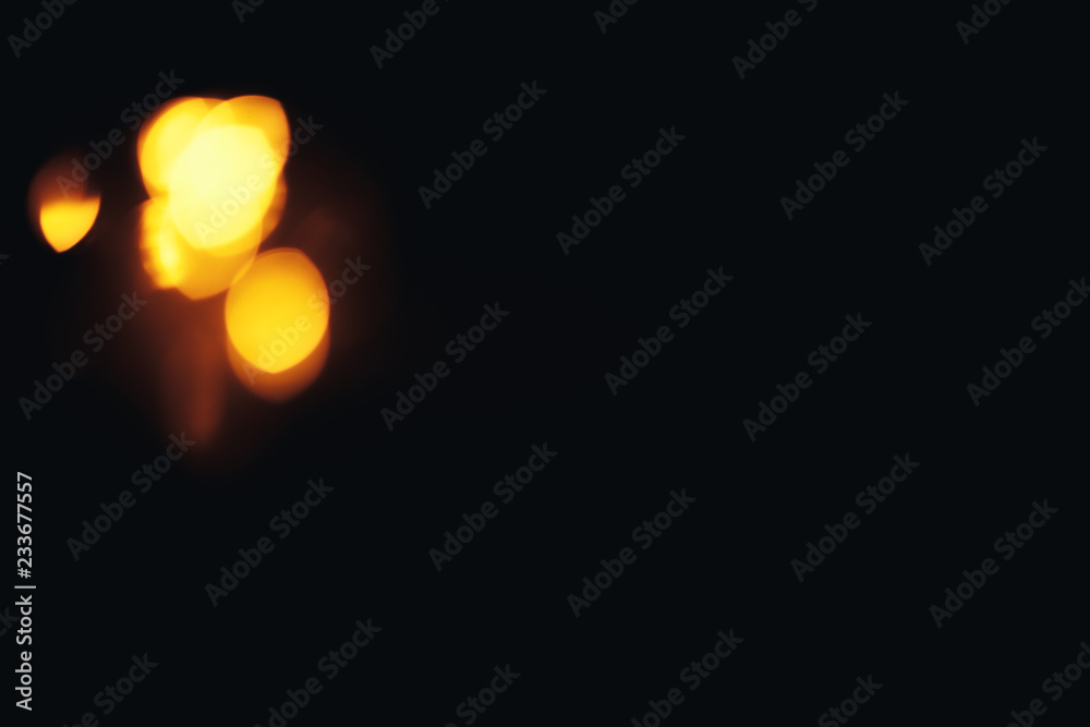 Defocused gold abstract christmas background. Bokeh. a little bit in corner Defocused gold abstract christmas background. Bokeh. a little bit in corner