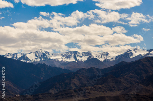 Snow covered Mountains under blue sky in Leh, Ladakh, Jammu and Kashmir, India © 12November