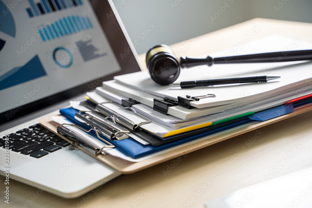 Judge and documents on office desk Legislation