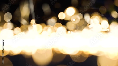 Wallpaper Mural yellow blurred metal sparks falling on the floor Torontodigital.ca