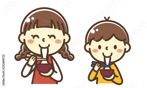 お雑煮を食べる子供