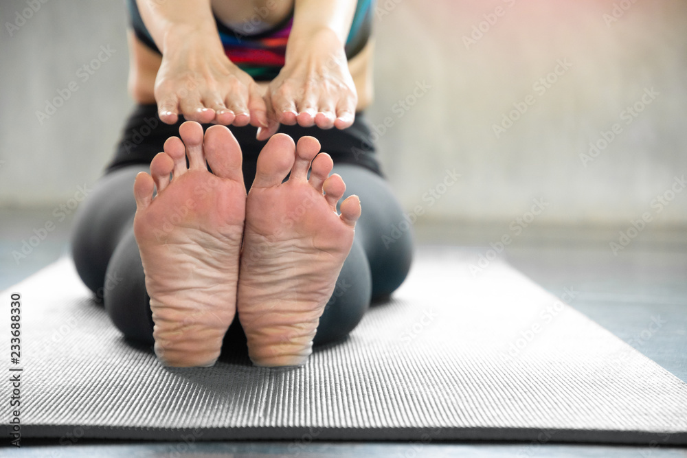 Close Up Of Young Female Feet Wear Sportswear Practicing Yoga Sitting Close Up Of Young Female Feet Wear Sportswear Practicing Yoga Sitting