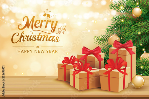 Christmas greeting card with gifts boxes on wooden table and tree bokeh background. Xmas and happy new year.