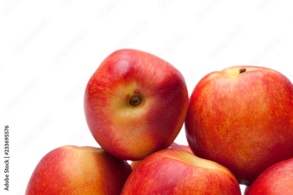 group of juicy peaches lying isolated on a white background group of juicy peaches lying isolated on a white background
