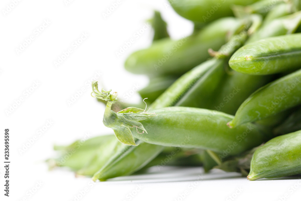 green fresh peas isolated on white background green fresh peas isolated on white background