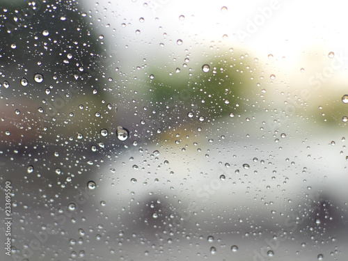 rain drops on window glass, Pattern of raindrops isolated on glasses surface,drops of water.