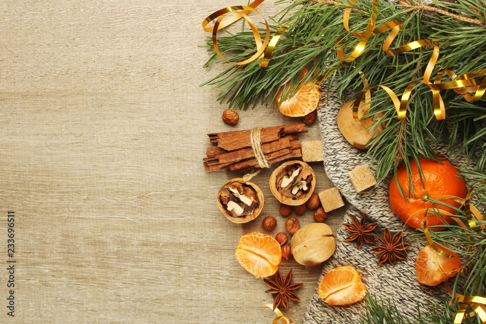 Still life formed with pine branches and New Year sweets