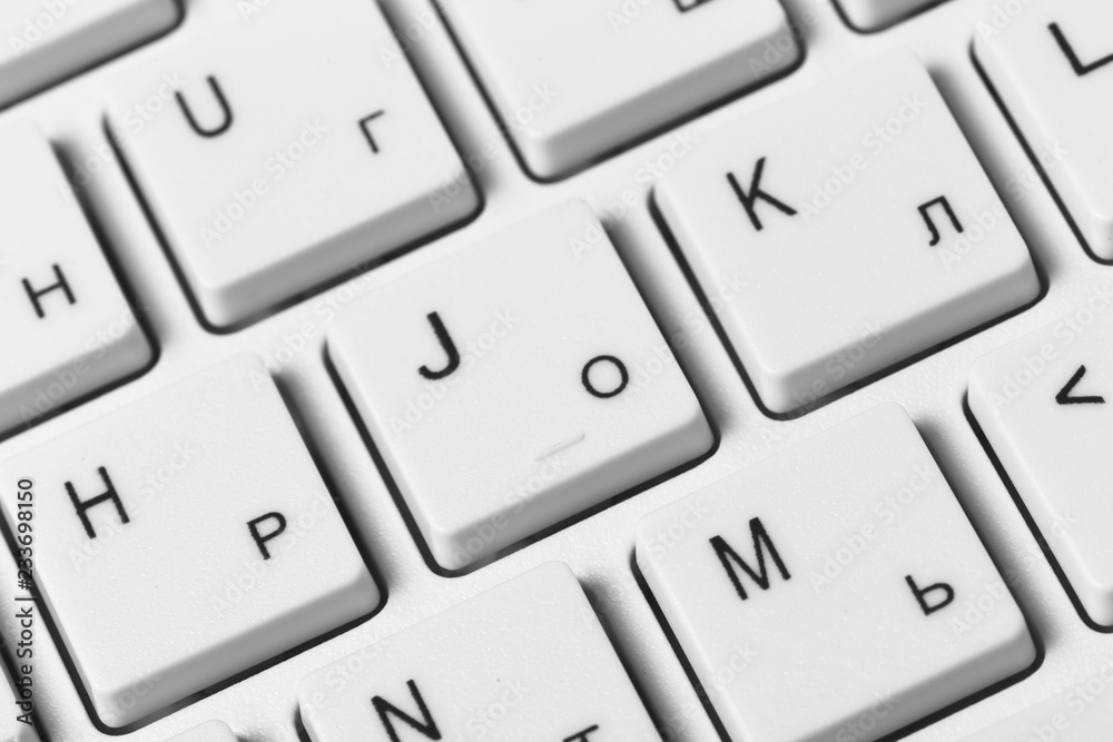 close up of a white computer keyboard close up of a white computer keyboard