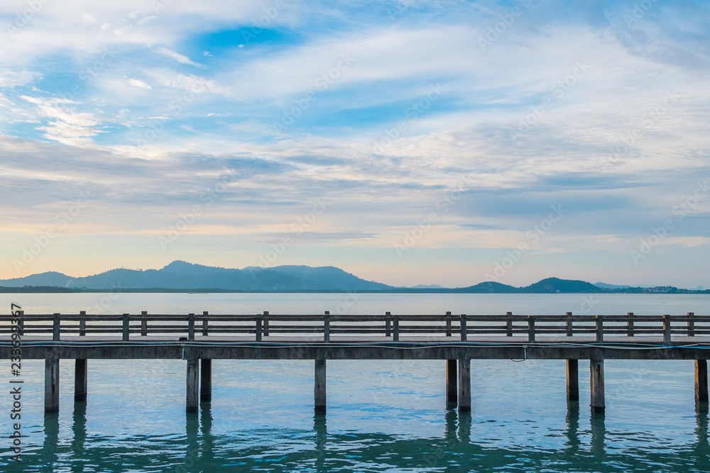 Obraz premium Beautiful bridge in the sea in the sunset is a natural relaxing.