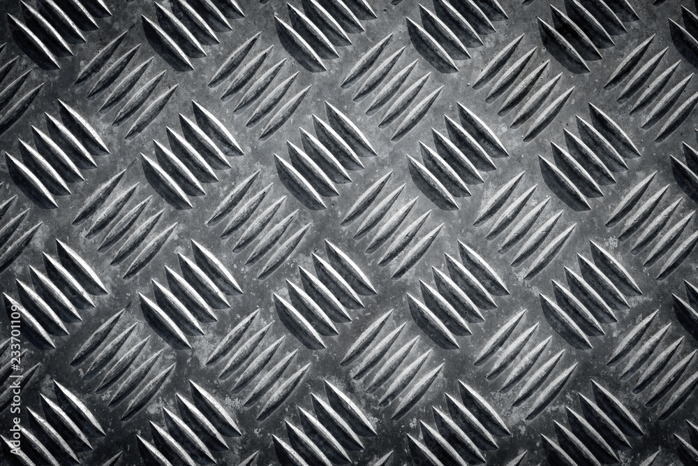 Metal floor plate with diamond pattern texture