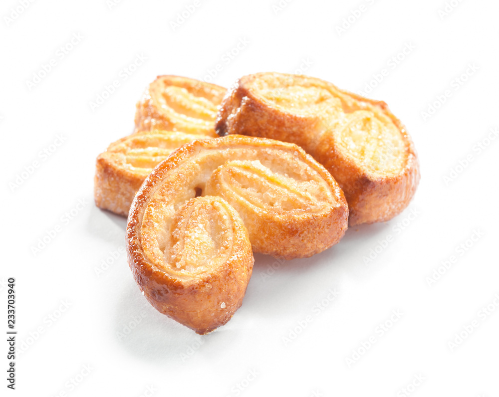 puff pastry dessert ear (palmier) biscuits with sugar close-up isolated on white background
