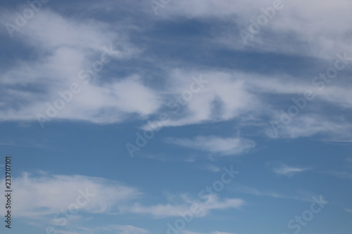 Fototapeta Naklejka Na Ścianę i Meble -  Bright Blue Sky with the Fluffy Cloud