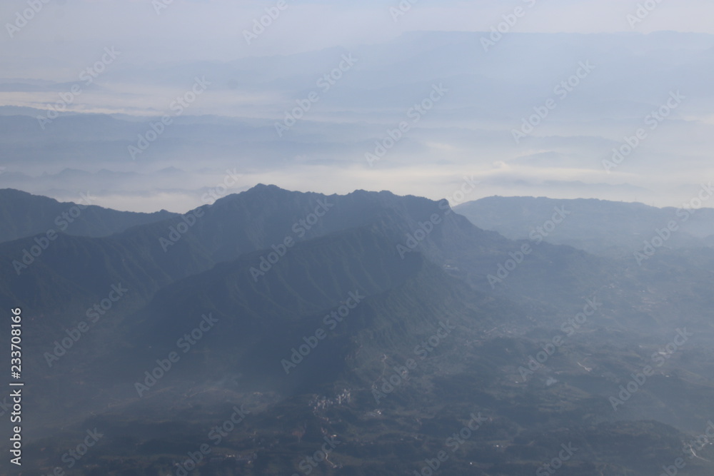 Fototapeta premium Clear Blue Sky with the Scenery of the Mountain in the Mist