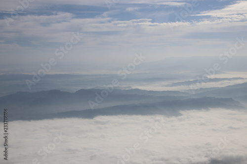 Clear Blue Sky with the Scenery of the Mountain in the Mist
