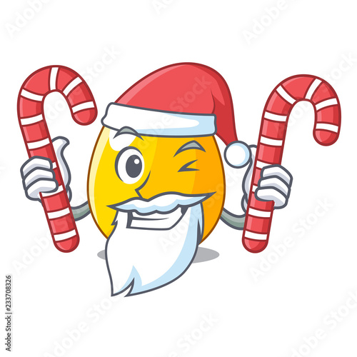 Santa with candy golden egg with cartoon shape reflection