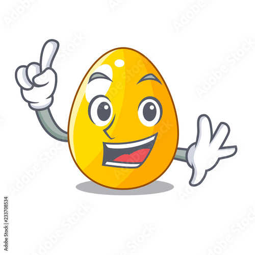 Finger golden egg with cartoon shape reflection photo