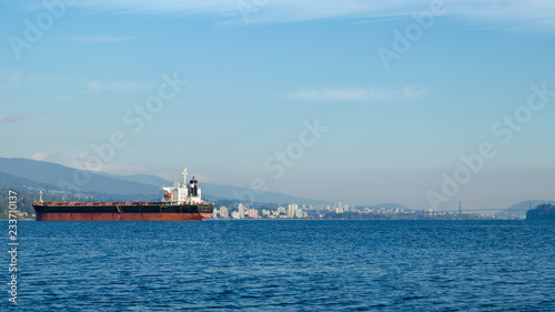 Downtown Vancouver with tanker ships in the foreground. © Adam