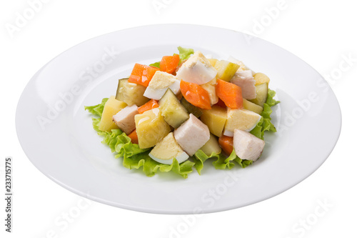 light diet salad with turkey, on a plate, on a white background, isolate