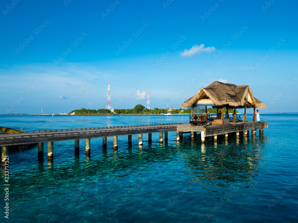Maldives island with jetty, Rsadoo Atoll, Indian Ocean, Maldives Maldives island with jetty, Rsadoo Atoll, Indian Ocean, Maldives