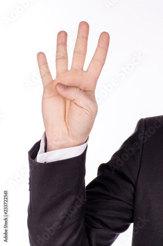 man's hand on white studio background. gesture number