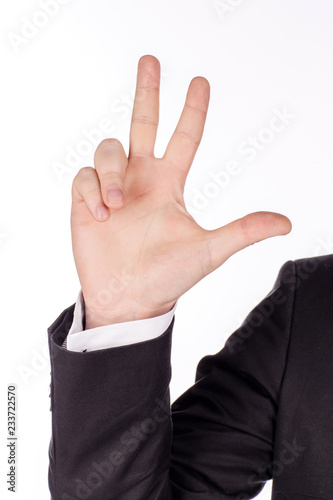 man's hand on white studio background. gesture number