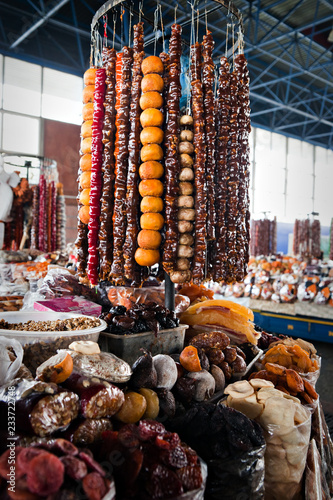 Churchhella.  National Georgian sweets with nuts and fruit juice churchhella  in the market photo