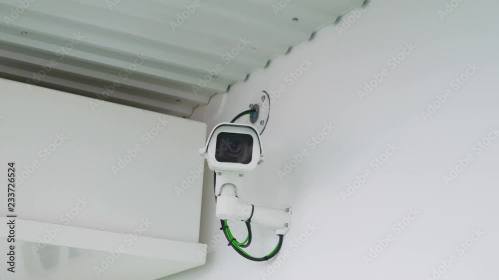 20906_Much_closer_look_of_the_lens_of_the_cctv_on_the_wall.mov