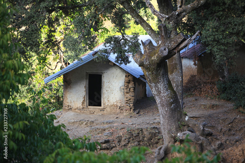 Empty house in the forest; Abandoned old House; Old traditional house of a morocco countryside