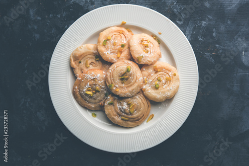 Chirote or Chiroti is a sweet dish from Karnataka and Maharashtra. Served in a plate as a dessert on Festivals or wedding. Selective focus photo