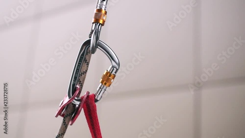 close-up of safety carabiner and rope