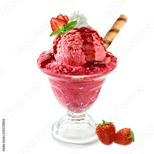 Strawberry ice cream and wafer stick in sundae cup or glass with fruits isolated on white background photo