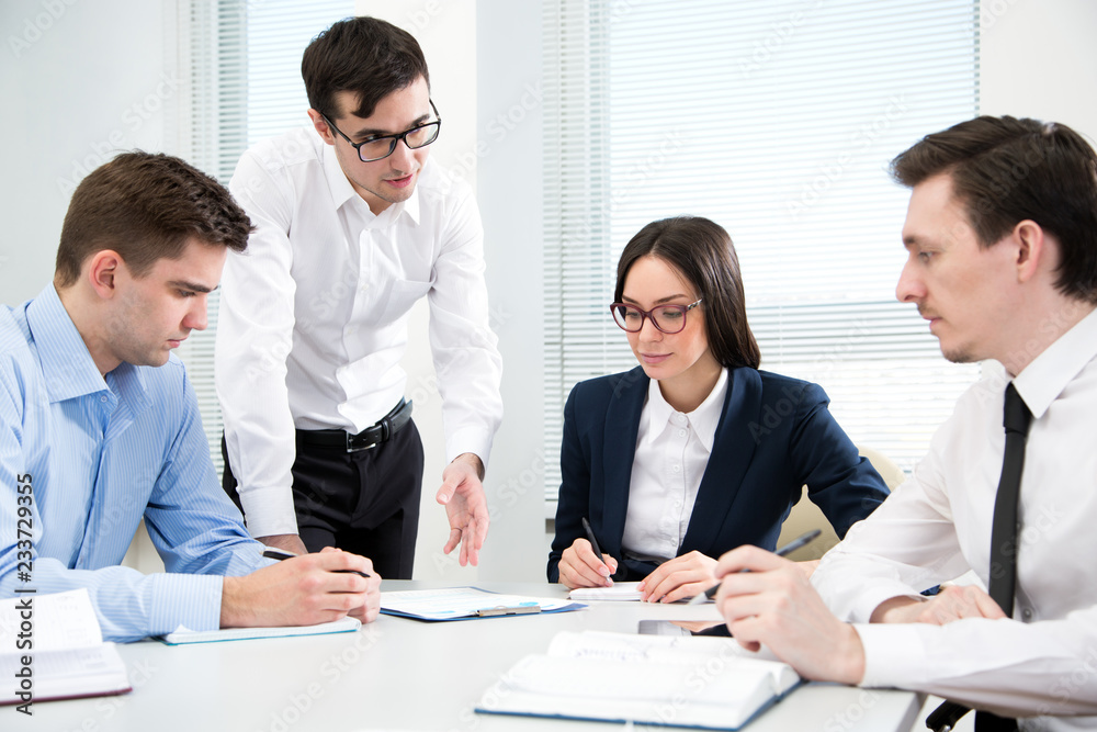 Businesspeople discuss a new project Businesspeople discuss a new project