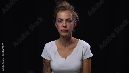 Beaten up woman on the verge of tears, social issues, domestic violence