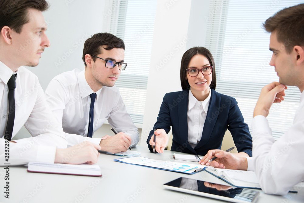 Businesspeople in a meeting at office Businesspeople in a meeting at office