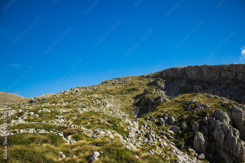 highland mountain rocks beautiful landscape and good place for hiking hobby activity in clear bright summer weather time 