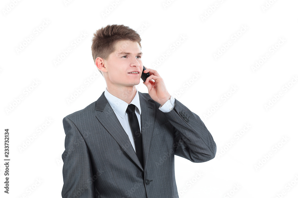 closeup.young businessman talking on mobile phone. isolated on white closeup.young businessman talking on mobile phone. isolated on white