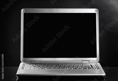 close up. opened laptop on dark background