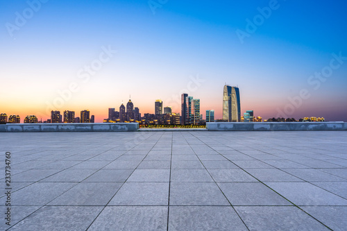 city skyline with empty square
