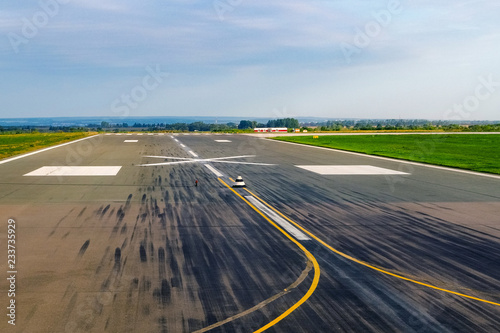 Airport runway. Detail of runway with pattern of wheels