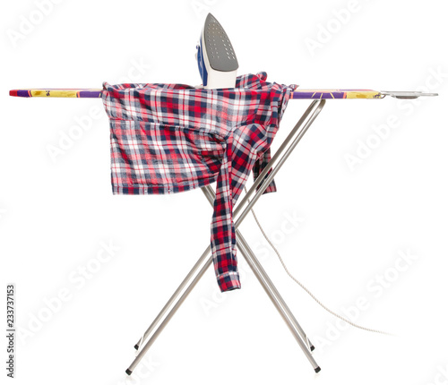 Iron a shirt on the ironing board on a white background. Isolation photo