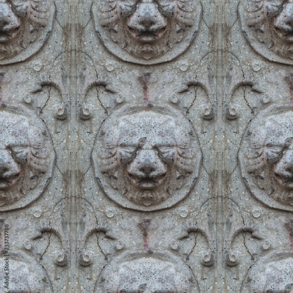 Seamless photo texture of antique stone lion head from broken castle wall