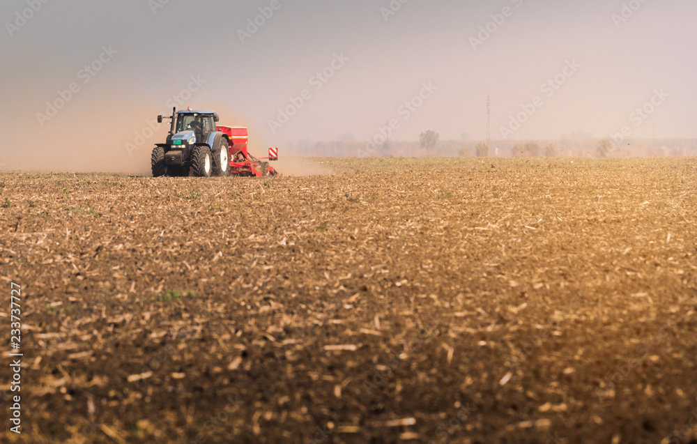 Fototapeta premium Plowing of stubble field