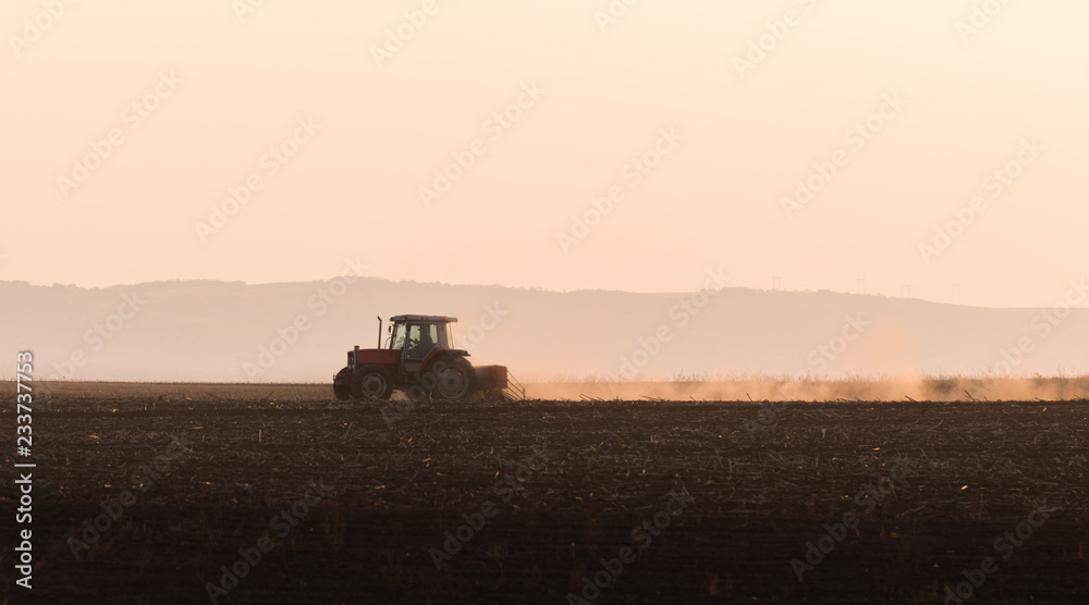 Fototapeta premium Plowing of stubble field