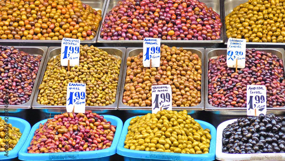 Assortment of all kind of olives on the stand in street market in Athens Greece Assortment of all kind of olives on the stand in street market in Athens Greece
