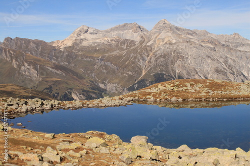 Hochalpiner See am Splügen / Bergseeli mit Teurihorn photo